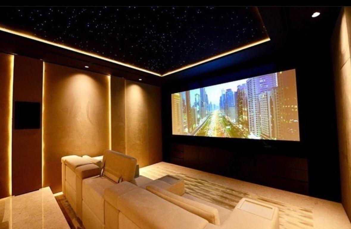 Luxury home cinema installation at Nurai Island villa by LuxSmart